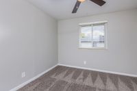 Bedroom with carpet & ceiling fan
