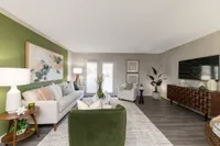 Spacious living room with hardwood-style flooring
