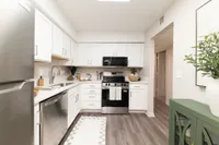 Kitchen with granite counters and stainless appliances
