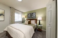 Bedroom with carpet