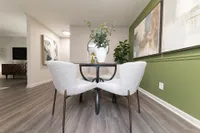 Dining area with hardwood-style flooring