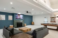 Resident lounge with entertainment and gathering spaces