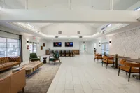 Open resident lounge designed for socializing and relaxation