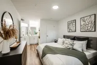 Spacious primary bedroom with additional sink