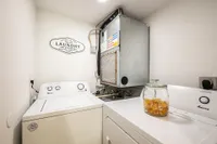 Laundry room with full-sized washer and dryer