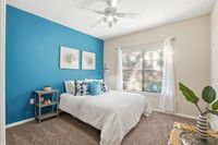 Guest room with space for night stands and a dresser for extra storage