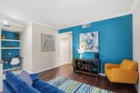 Open concept livingroom off of the entry with spacious layout