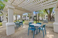 Outdorr seating with tables near grills