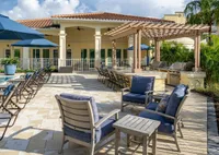 Residents Gathering at the seating area | Apartment in Sarasota, FL | Alloro at University Groves