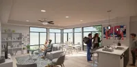 Modern open-concept living space with stylish furniture, large windows, and contemporary art, perfect for social gatherings and relaxation.