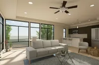 Bright and modern open-concept living room with large windows, stylish furnishings, and a sleek kitchen bar.