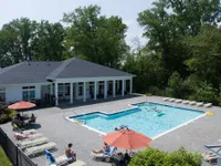 Elevated view of people enjoying the Kensington private pool