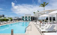Rooftop pool with cabana seating