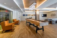 Clubroom with Shuffleboard and Foosball