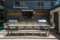 Rooftop grilling and dining areasRooftop grilling and dining areas