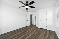 Renovated Apartment - Wood-plank flooring, sliding doors, ceiling fan in bed room at  | The Residence at Turnberry | Columbus Apartments