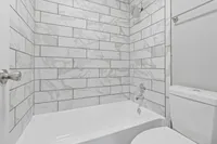 Tiled Tub & Shower Renata on Fredericksburg Apartments, San Antonio, Texas
