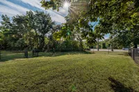 Tranquil outdoor space with lush greenery, perfect for relaxation and enjoying nature.
