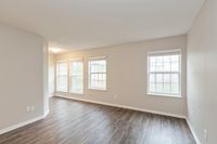 Living Room Room with a ton of natural lighting