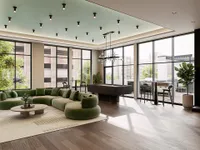 Elegant living space with green sectional sofa, modern lighting, and floor-to-ceiling windows overlooking city view.