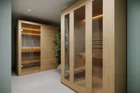 Luxurious apartment sauna featuring elegant wooden interiors and serene ambiance.