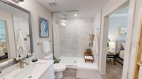 Walk-In shower with waterfall shower head in all of our homes at Triton Cay Fort Myers