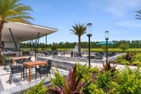 Fire Pit and Tables | Apartments in Jacksonville, FL | The Menlo