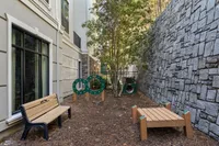 Relax and unwind in our inviting outdoor nook, perfect for leisure and play.