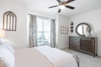 Experience tranquility in this beautifully designed bedroom, perfect for relaxation.