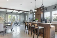 Experience the perfect blend of style and comfort in this open living space, complete with a chic kitchen.
