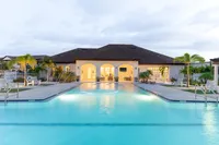Experience serene living in this elegant complex featuring a captivating poolside view.