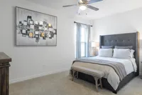 Experience tranquility in this elegantly designed bedroom, where comfort meets style.