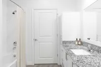 Experience luxury with this stylish bathroom featuring sleek finishes.