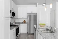 Experience culinary excellence in this modern kitchen with top-of-the-line finishes.