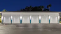 Well-lit row of modern garage doors with clean and stylish design.