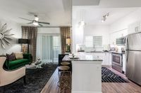 Elegant open-concept living area blending modern kitchen with granite countertops and chic living room featuring plush seating and stylish decor.