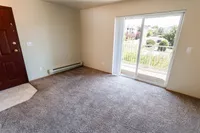 Living Room Leading to Private Patio/Balcony