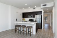 Kitchen with Large Island and Open Living Area