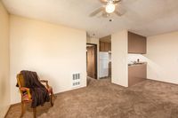 1 bedroom apartment home with carpet and kitchen