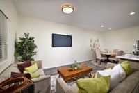 living space with connected kitchen