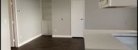 living space with connected kitchen