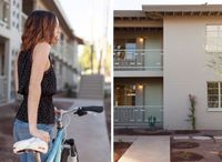 split image of woman standing with bike and 2 story apartment building at Oasis 20