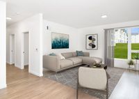 rendering of Living room with sofa and tv console and Wood-Style Flooring at Twelve Mile Crossing