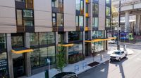 drone view of entrance to oro apartments