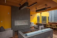 Rooftop Terrace with outdoor fireplace and lounge area and Portland City Views