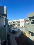 walkway in between two apartment buildings at Monterey Apartments