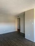 bedroom with vinyl wood like flooring at deer valley village