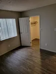 Bedroom with a walk-in closet
