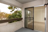 Balcony with sliding door and view