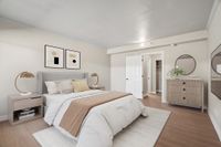 Virtually staged one-bedroom at Solaris at Tucson showing the bedroom with a bed, dresser, nightstands